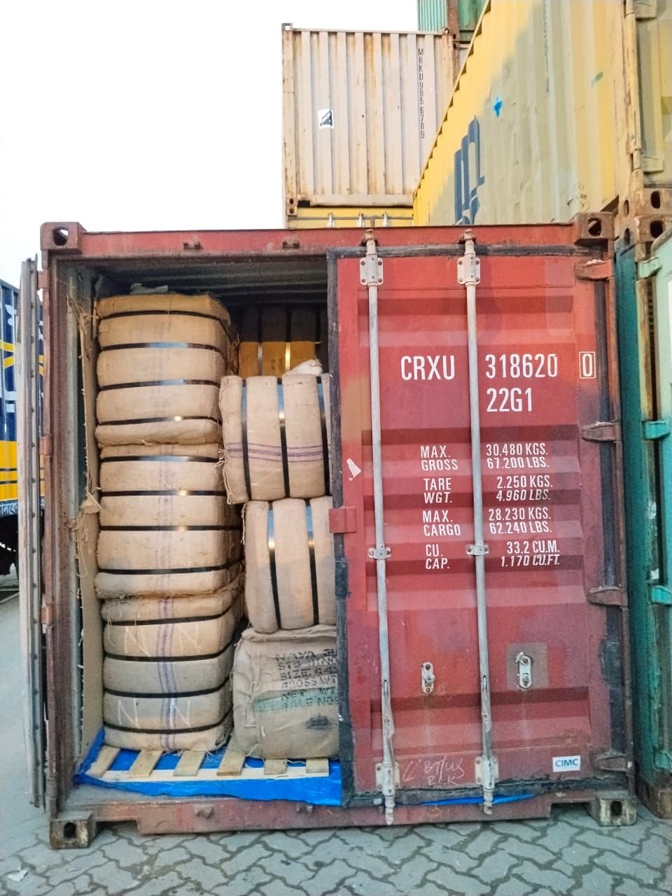 Loading jute bales into a shipping container